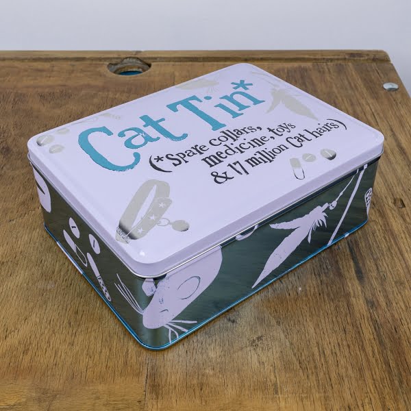 the bright side cat tin